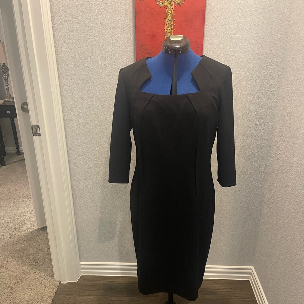 Lovely neckline, versatile designer dress